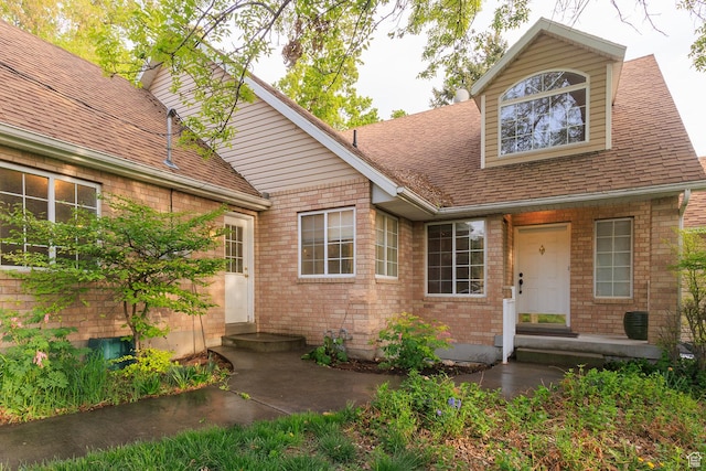 724 E 3230 N, Provo, UT 84604 - view of front facade featuring brick siding and a shingled roof