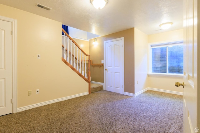 724 E 3230 N, Provo, UT 84604 - interior space featuring a textured ceiling, carpet, stairs, baseboards, and visible vents