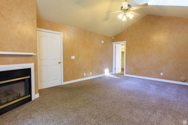 724 E 3230 N, Provo, UT 84604 - unfurnished living room with carpet floors, ceiling fan, a glass covered fireplace, and lofted ceiling