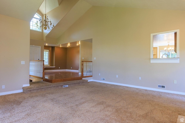 724 E 3230 N, Provo, UT 84604 - spare room with carpet floors, high vaulted ceiling, a notable chandelier, and visible vents