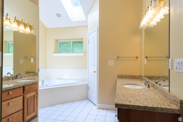 724 E 3230 N, Provo, UT 84604 - bathroom featuring a sink, two vanities, tile patterned floors, and a skylight