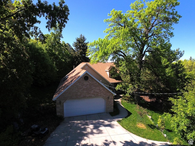724 E 3230 N, Provo, UT 84604 - view of front facade featuring brick siding and driveway