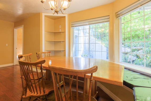 724 E 3230 N, Provo, UT 84604 - dining space featuring baseboards, a chandelier, plenty of natural light, and wood finished floors