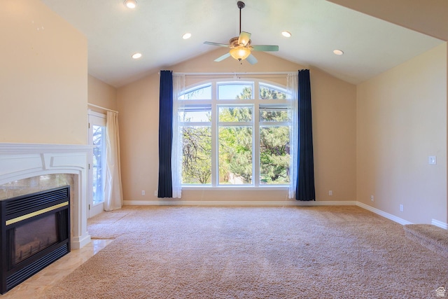 724 E 3230 N, Provo, UT 84604 - unfurnished living room with ceiling fan, light carpet, a healthy amount of sunlight, and a tile fireplace