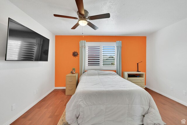 267 W 1600 N, Layton, UT 84041 - bedroom featuring baseboards, ceiling fan, and wood finished floors