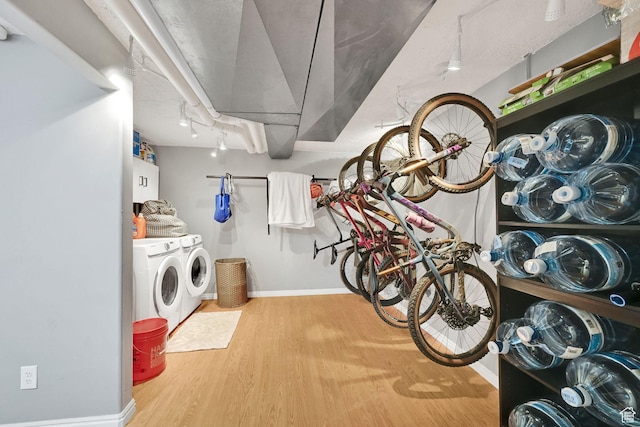 267 W 1600 N, Layton, UT 84041 - laundry area featuring baseboards, wood finished floors, and washer and clothes dryer