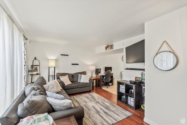 living room with wood finished floors