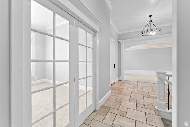 359 E 680 N, Lindon, UT 84042 - hall featuring stone tile floors, ornamental molding, a chandelier, and baseboards