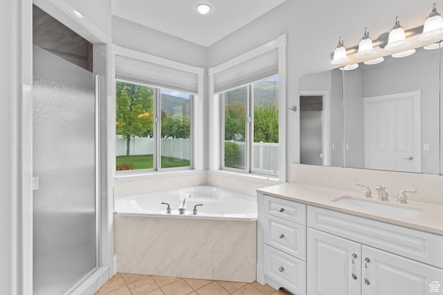 359 E 680 N, Lindon, UT 84042 - bathroom featuring vanity, a shower stall, a garden tub, and tile patterned flooring