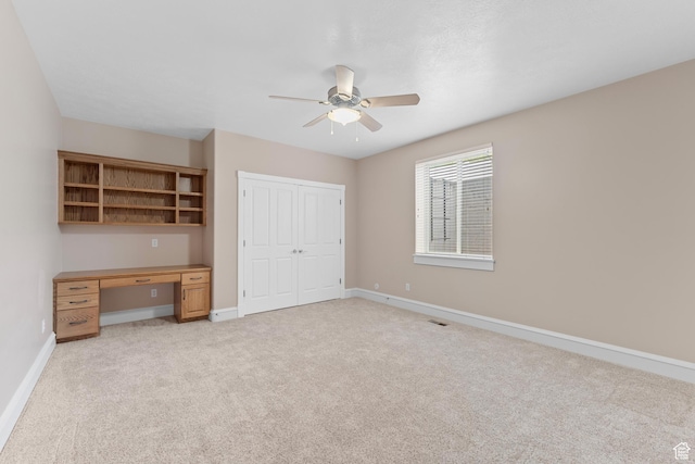 359 E 680 N, Lindon, UT 84042 - unfurnished bedroom featuring baseboards, light carpet, a closet, and a ceiling fan