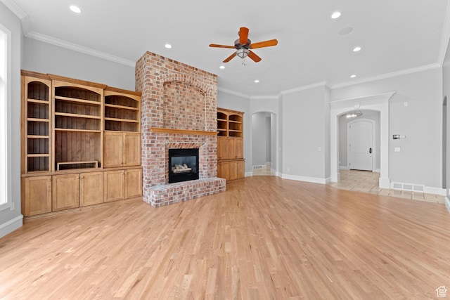 359 E 680 N, Lindon, UT 84042 - unfurnished living room featuring arched walkways, ceiling fan, light wood-style flooring, recessed lighting, and baseboards