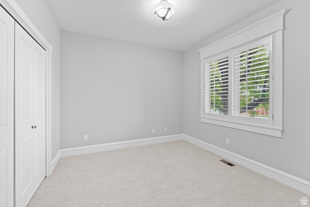 359 E 680 N, Lindon, UT 84042 - unfurnished bedroom with carpet, a closet, and baseboards
