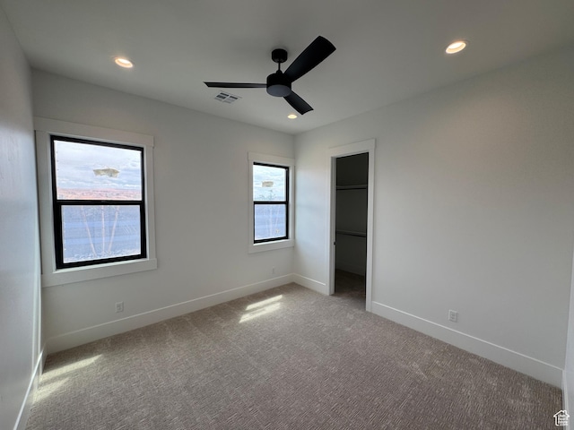 5269 W 2040 S, Hurricane, UT 84737 - unfurnished bedroom featuring carpet floors, baseboards, recessed lighting, and a spacious closet