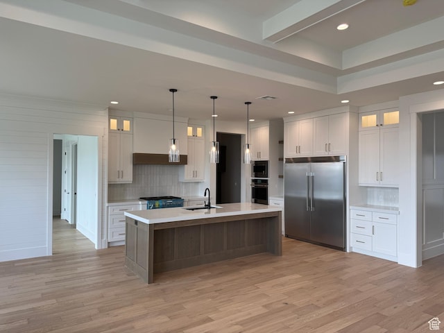 5269 W 2040 S, Hurricane, UT 84737 - kitchen with built in appliances, decorative backsplash, a sink, and light countertops