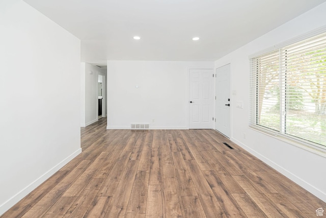 4432 Orchard Ave, South Ogden, UT 84403 - spare room featuring recessed lighting, baseboards, visible vents, and wood finished floors