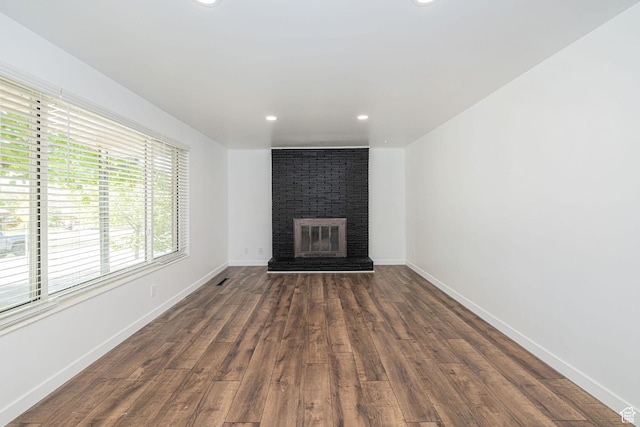 4432 Orchard Ave, South Ogden, UT 84403 - unfurnished living room with recessed lighting, baseboards, wood finished floors, and a fireplace