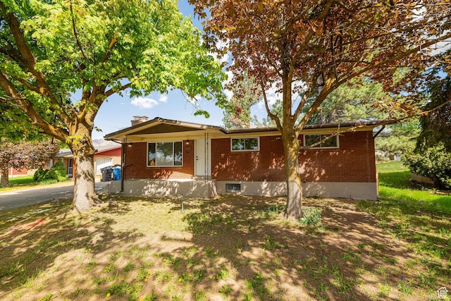 4432 Orchard Ave, South Ogden, UT 84403 - ranch-style home featuring brick siding, driveway, and a chimney