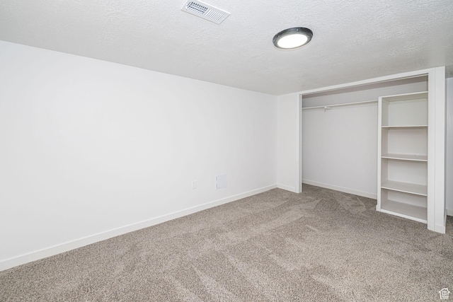 4432 Orchard Ave, South Ogden, UT 84403 - unfurnished bedroom featuring a textured ceiling, carpet, baseboards, visible vents, and a closet