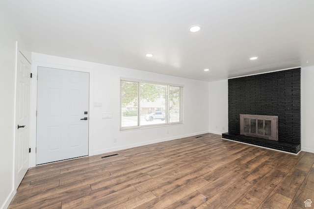 4432 Orchard Ave, South Ogden, UT 84403 - unfurnished living room with recessed lighting, visible vents, wood finished floors, and a fireplace