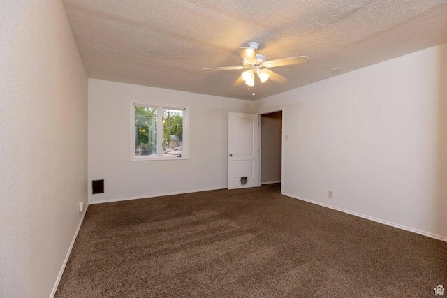 623 E 160 S, St George, UT 84770 - unfurnished room with baseboards, a textured ceiling, ceiling fan, and dark carpet