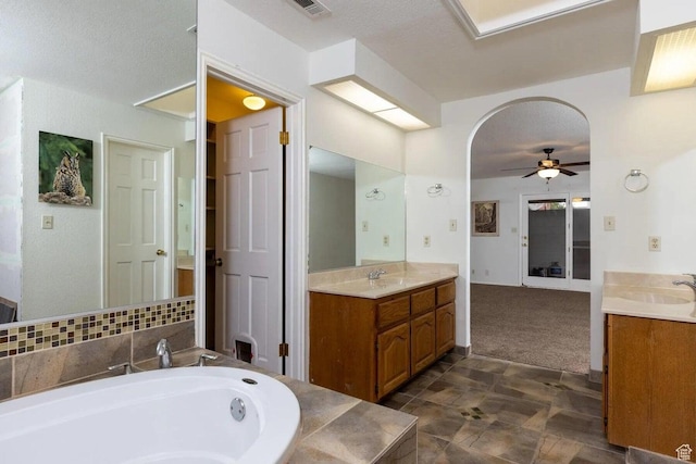 623 E 160 S, St George, UT 84770 - full bathroom with a sink, ceiling fan, two vanities, and a bath