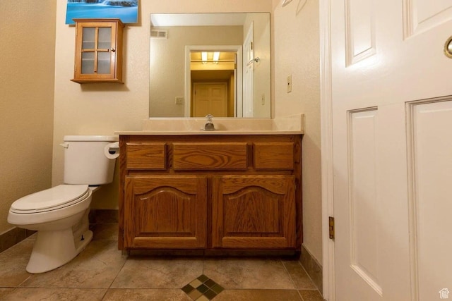 623 E 160 S, St George, UT 84770 - half bathroom with baseboards, vanity, toilet, and visible vents