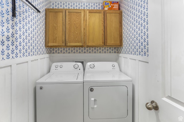 1150 W 200 S, Logan, UT 84321 - laundry area featuring cabinet space, wainscoting, a decorative wall, separate washer and dryer, and wallpapered walls