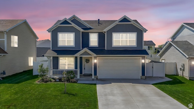 1150 W 200 S, Logan, UT 84321 - view of front facade featuring board and batten siding, fence, driveway, and a porch