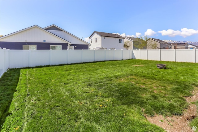 1150 W 200 S, Logan, UT 84321 - view of yard featuring a fenced backyard and a residential view