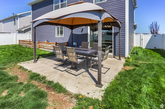 1150 W 200 S, Logan, UT 84321 - view of patio with a gazebo, a fenced backyard, and outdoor dining space