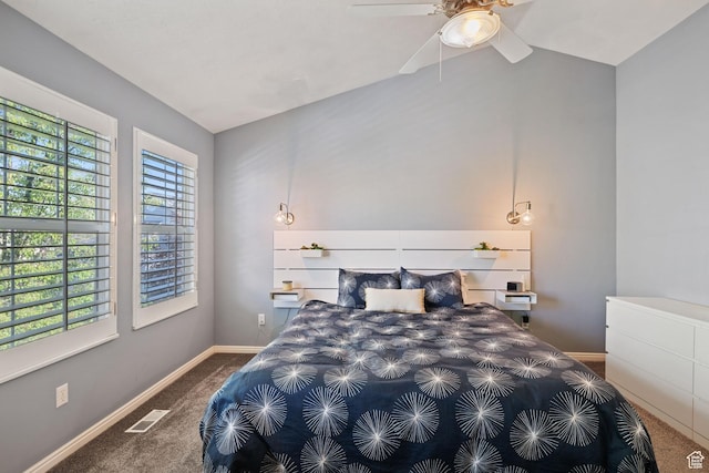 carpeted bedroom with baseboards, visible vents, ceiling fan, and vaulted ceiling