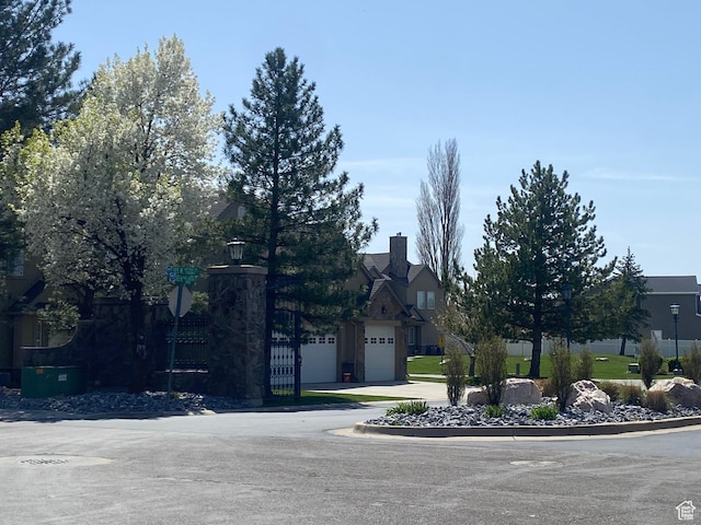 948 Shetland Ln Unit 17, Farmington, UT 84025 - view of front of house featuring driveway and a garage