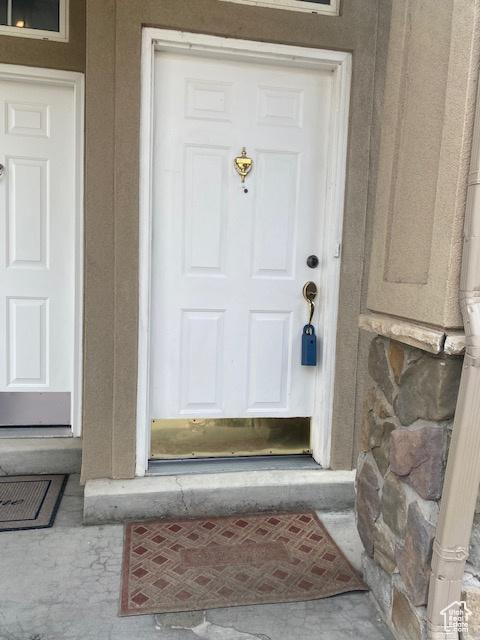 948 Shetland Ln Unit 17, Farmington, UT 84025 - doorway to property with stone siding