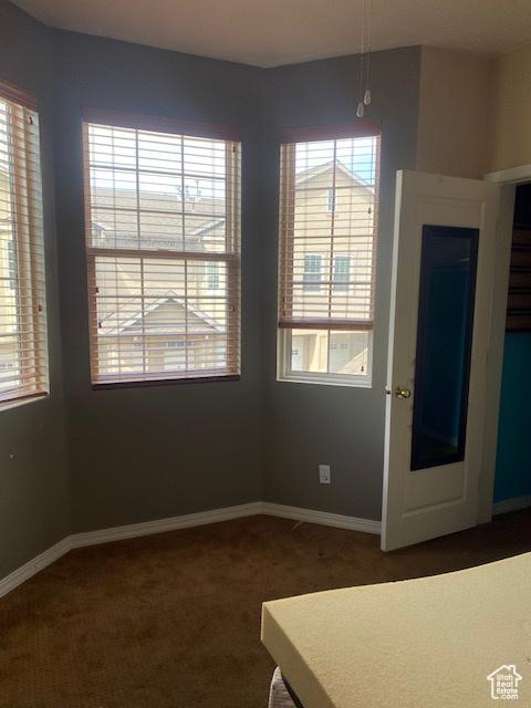 948 Shetland Ln Unit 17, Farmington, UT 84025 - unfurnished dining area featuring baseboards and carpet
