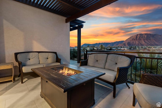 2600 Ocotillo Way Unit 31, Santa Clara, UT 84765 - balcony with a mountain view, a pergola, an outdoor living space with a fire pit, and a patio area
