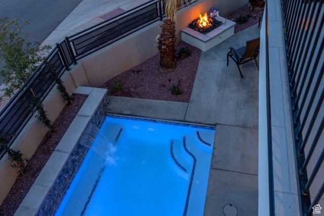 2600 Ocotillo Way Unit 31, Santa Clara, UT 84765 - view of pool with an outdoor fire pit