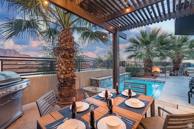 2600 Ocotillo Way Unit 31, Santa Clara, UT 84765 - view of patio with a grill, a fenced backyard, a pergola, and outdoor dining space