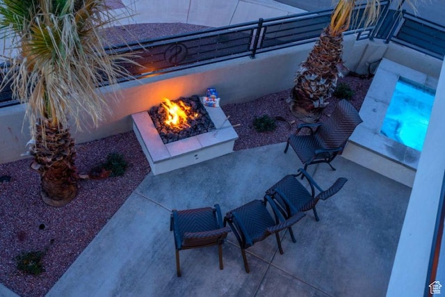 2600 Ocotillo Way Unit 31, Santa Clara, UT 84765 - view of patio with an outdoor fire pit