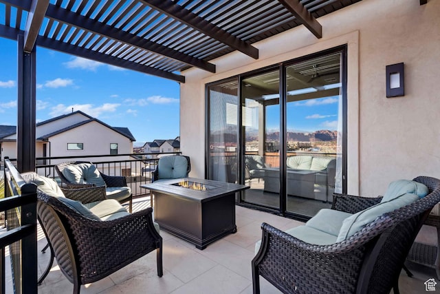 2600 Ocotillo Way Unit 31, Santa Clara, UT 84765 - view of patio / terrace featuring a pergola and an outdoor living space with a fire pit