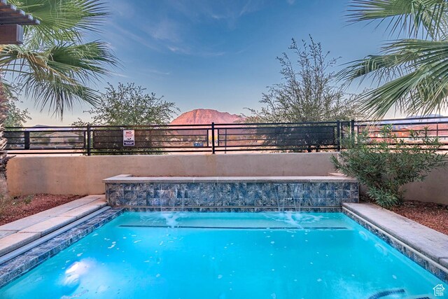 2600 Ocotillo Way Unit 31, Santa Clara, UT 84765 - view of pool featuring a fenced backyard and a mountain view