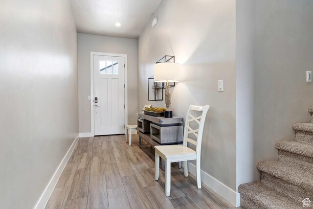 2600 Ocotillo Way Unit 31, Santa Clara, UT 84765 - foyer entrance with stairway, light wood-type flooring, and baseboards
