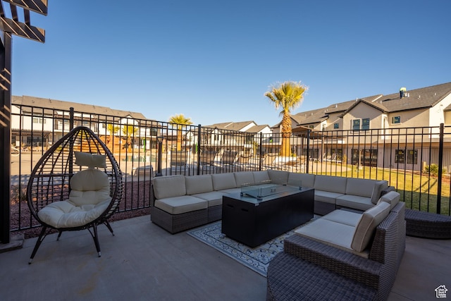 2600 Ocotillo Way Unit 31, Santa Clara, UT 84765 - view of patio with an outdoor living space with a fire pit, a residential view, and fence