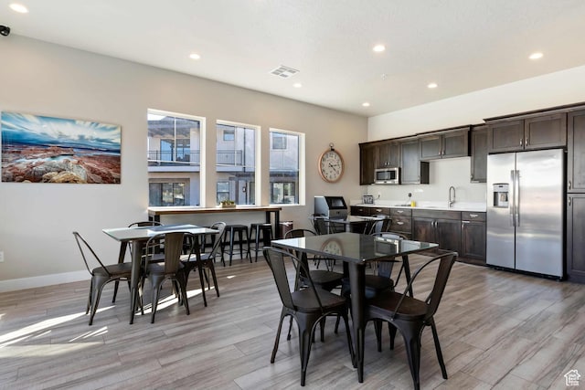 2600 Ocotillo Way Unit 31, Santa Clara, UT 84765 - dining space with recessed lighting, light wood-style floors, and baseboards