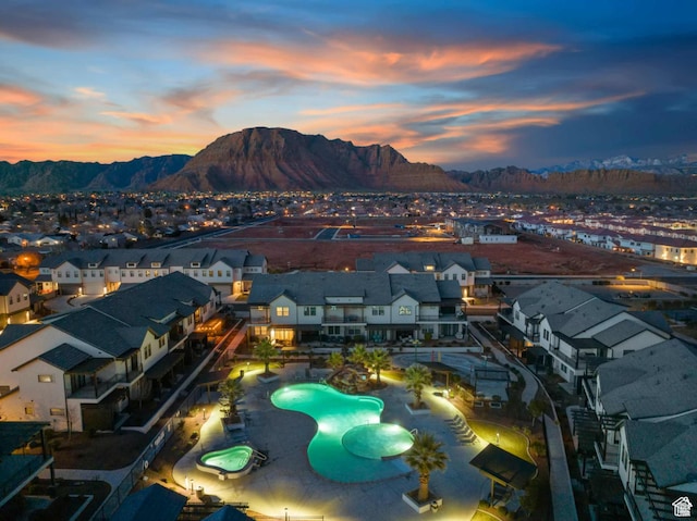 2600 Ocotillo Way Unit 31, Santa Clara, UT 84765 - aerial view of property and surrounding area featuring a pool area, mountains, and nearby suburban area