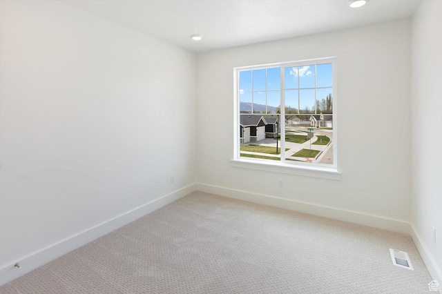 3030 S 400 W, Nibley, UT 84321 - unfurnished room with light colored carpet, baseboards, and visible vents
