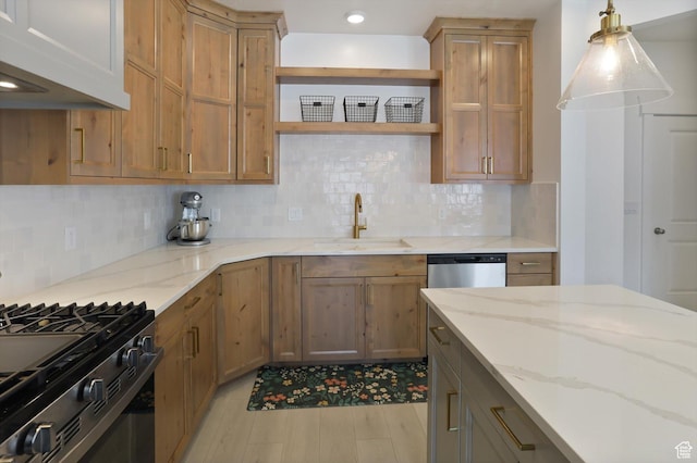 3030 S 400 W, Nibley, UT 84321 - kitchen featuring backsplash, open shelves, a sink, light wood-style floors, and gas range oven