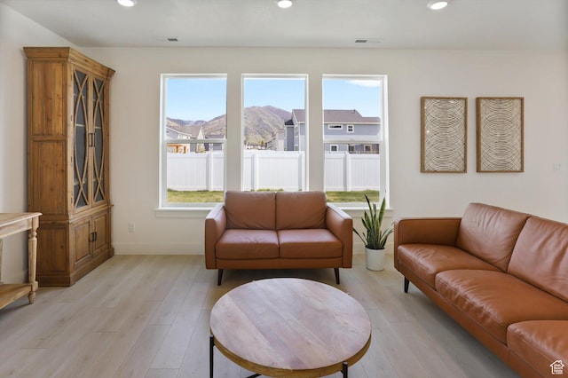 3030 S 400 W, Nibley, UT 84321 - living area with recessed lighting, visible vents, plenty of natural light, and light wood-type flooring