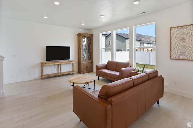 3030 S 400 W, Nibley, UT 84321 - living area featuring visible vents, recessed lighting, light wood finished floors, and baseboards