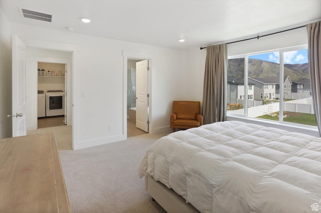 3030 S 400 W, Nibley, UT 84321 - bedroom featuring washer and dryer, light colored carpet, recessed lighting, baseboards, and visible vents