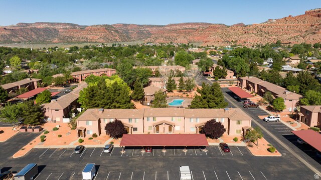 300 E 300 N Unit L5, Kanab, UT 84741 - aerial view of property and surrounding area featuring a mountainous background